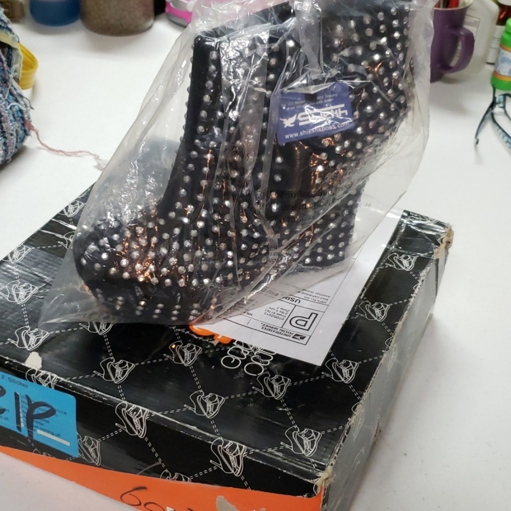 Ankle booties black covered with  rhinestones
